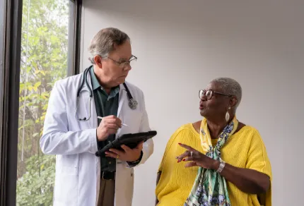 Doctor speaking to patient