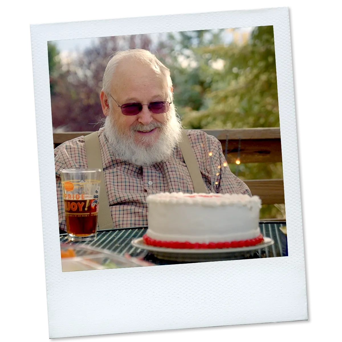 Polaroid of Joy, a real TAVR patient, standing in a train station